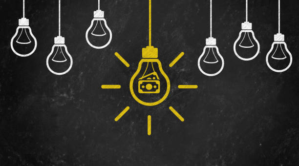istock banknote Symbol with Bulb Concept Chalk Drawing on Blackboard 1144645992