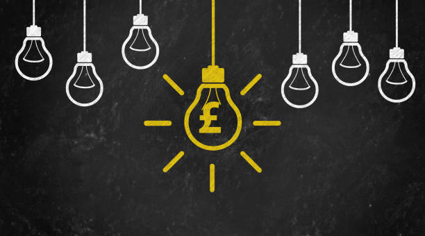 istock pound Symbol with Bulb Concept Chalk Drawing on Blackboard 1144646064