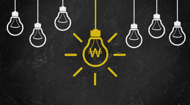 istock won Symbol with Bulb Concept Chalk Drawing on Blackboard 1144646159
