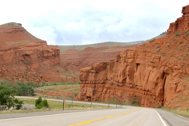 Driving view Red Rocks along a Wyoming Highway, USA stock photo