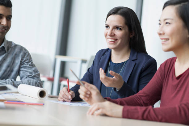 istock Woman talking during design meeting 1144649492