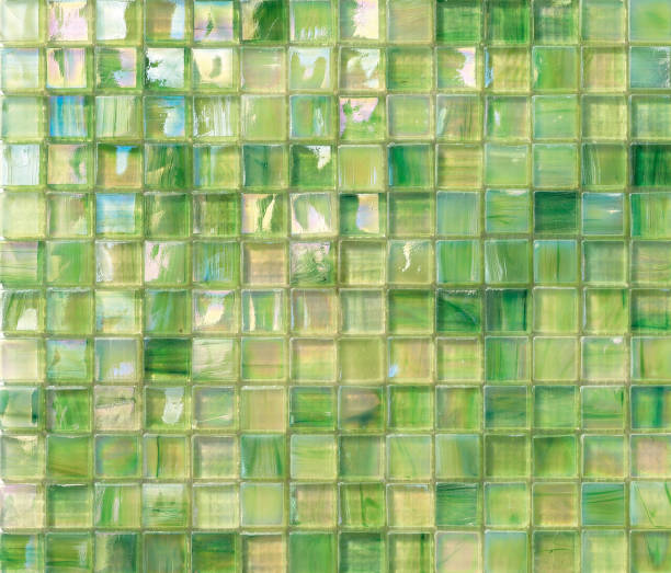 istock Bright iridescent green mosaic tiles texture background. 1144654542