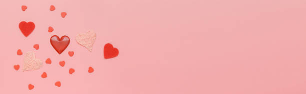 istock Pattern made of red hearts on pink background. Flat lay, top view, copy space 1144655202