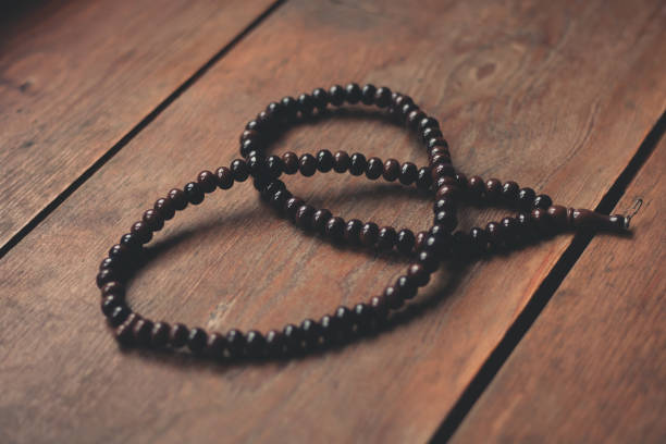 istock Praying Beads on the Wooden Ground 1144656846