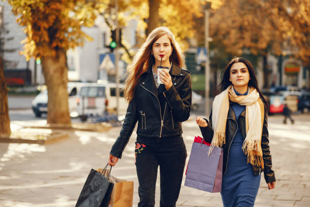 istock girls in a shopping 1144659498