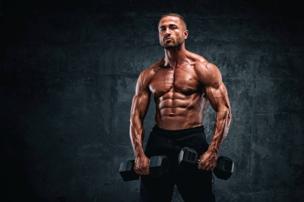 istock Strong Muscular Men Flexing Muscles 1144660777