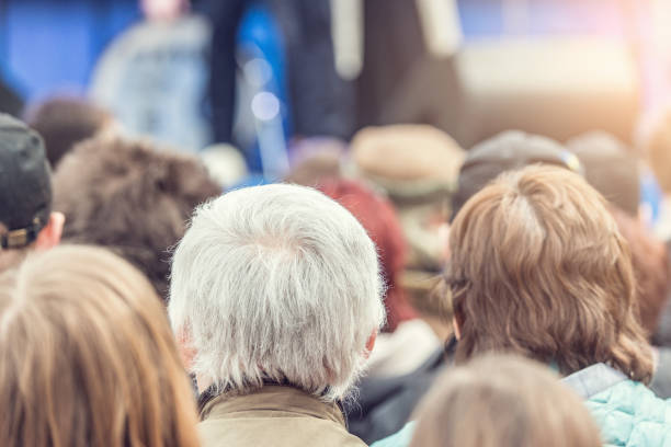 istock The audience watching the concert on stage. 1144661887