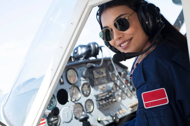 istock beautiful woman light airline pilot 1144667281