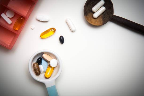 istock Medicine measured out for a daily dose to take tablets 1144667327