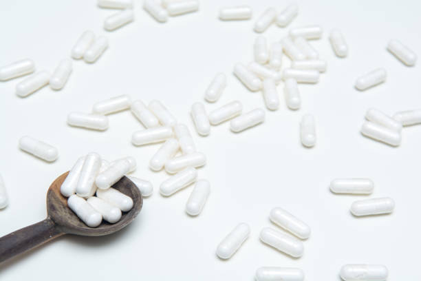 istock Plain white tablets for a dose of medicine 1144668380