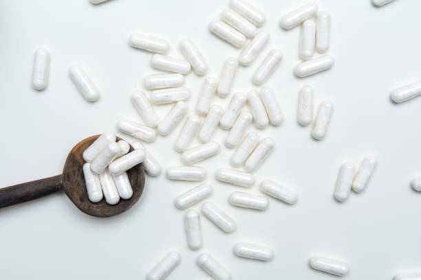 istock Plain white tablets for a dose of medicine 1144668434