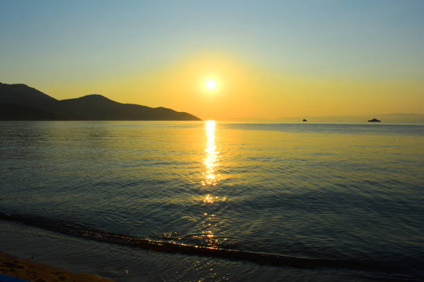 istock Sunset by the sea. 1144670300