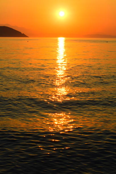 istock Sunset by the sea. 1144670372