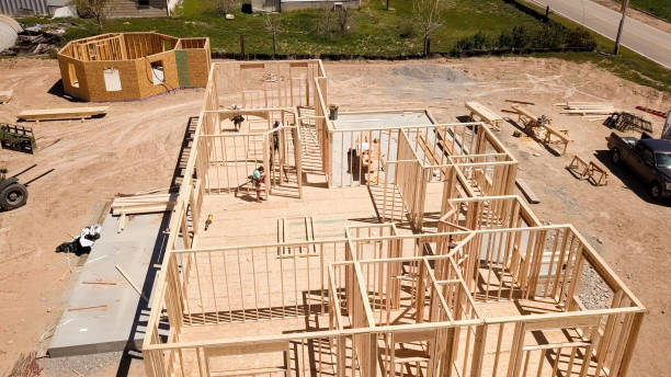 istock Drone View of a Home being Framed by Carpenters 1144671433