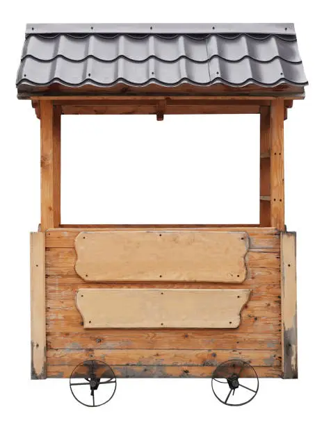 Photo of Wooden market stand stall with metal brown awning on wheels