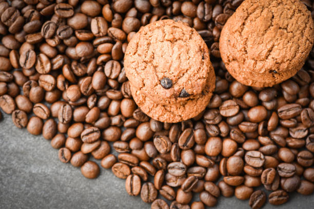 istock Chocolate cookies coffee beans roasted background 1144677223