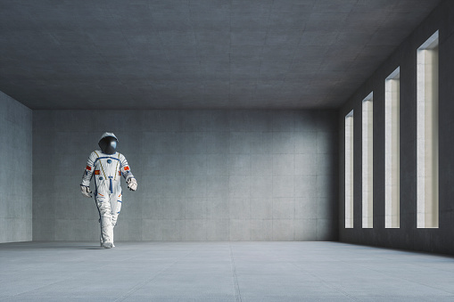 Empty modern concrete office with walking spaceman. This is entirely 3D generated image.