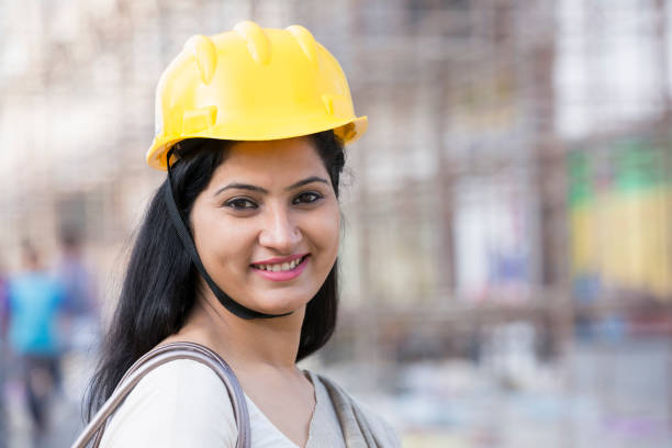 istock Portrait of happy female architect at construction site 1144677981
