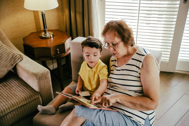 istock Grandmoter reading a book for her small grandson 1144679092