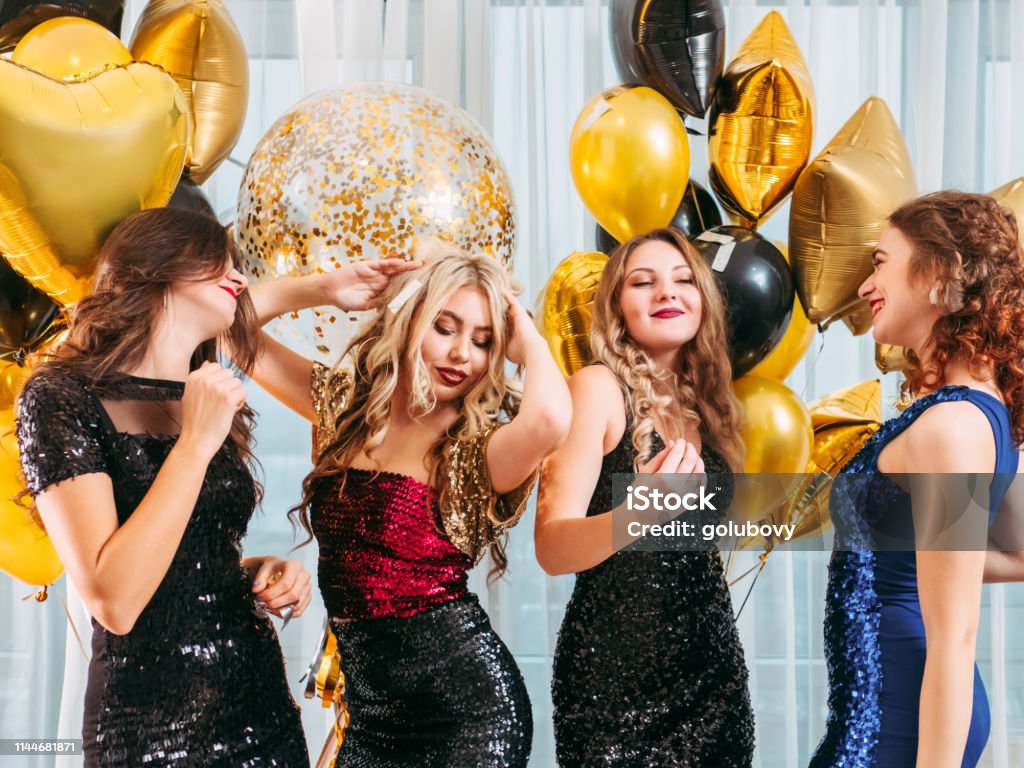 Party Dancing Girls Flaunting Festive Hairstyle Stock Photo - Download  Image Now - Adult, Balloon, Beautiful People - iStock