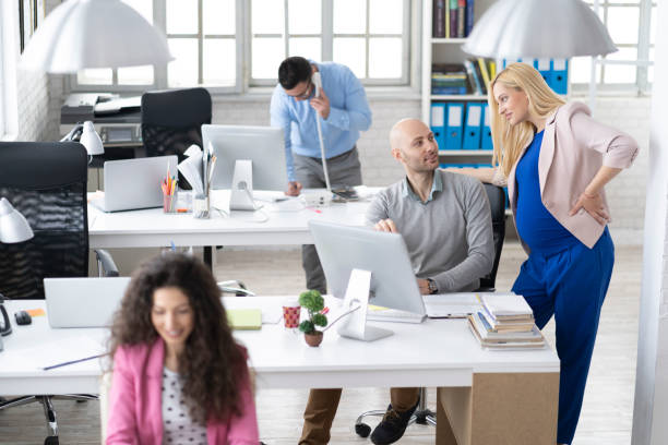 istock Coworkers discussing ideas at workplace 1144682974