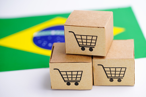 Box with shopping cart logo and Brazil flag : Import Export Shopping online or eCommerce delivery service store product shipping, trade, supplier concept.