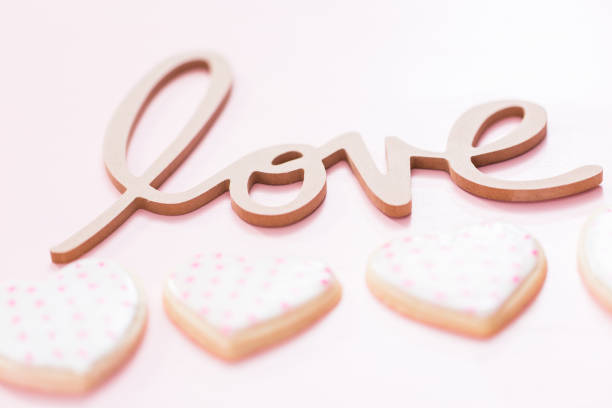 istock LOVE sign with heart shaped sugar cookies 1144692377