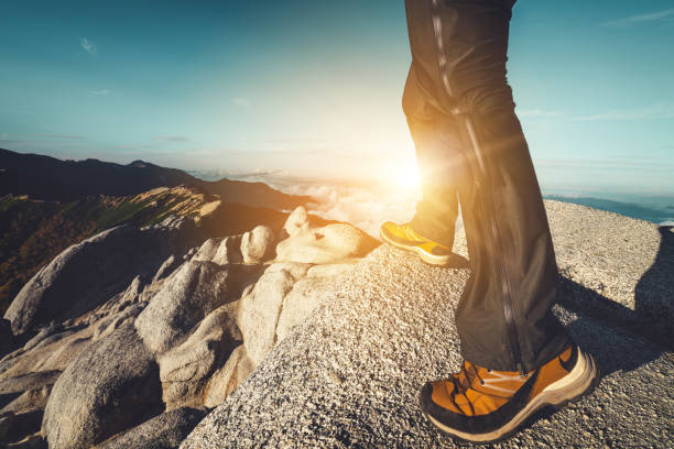 istock Traveler trekking on mountain. 1144696618