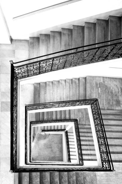 Interior staircase with black iron railing