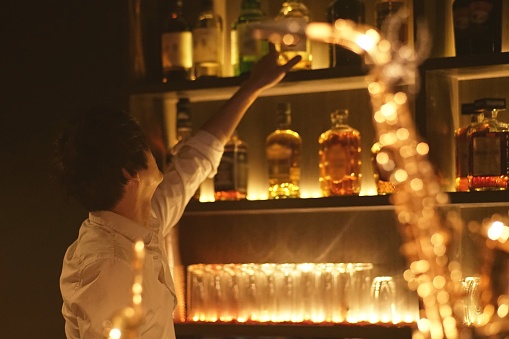 Young man working at a bar,Japan