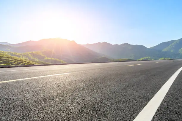 Photo of Country highway and green mountains natural landscape