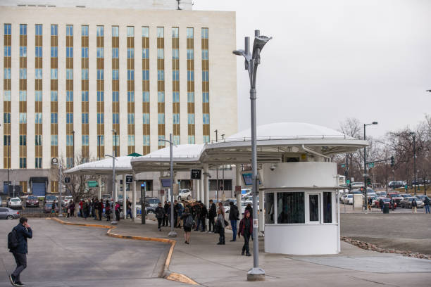Calgary, Canada - October 27, 2011: A new street level train station for Calgary's C-train.  Calgary has been rapidly expanding their light rail transit system with new stations and a West-LRT line expanding on a service which is currently the second busiest light rail transit system in North America.