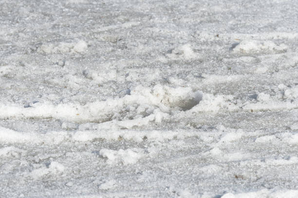 istock Early spring snow texture close up.  Abstract natural background 1144709931