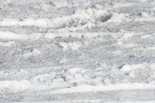 istock Early spring snow texture close up.  Abstract natural background 1144709947