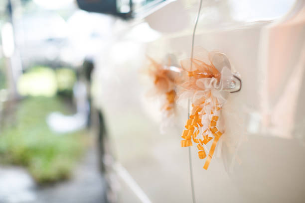 istock Wedding car decoration orange ribbon 1144716453