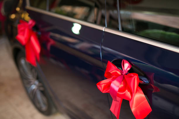 istock Wedding car decoration red ribbon 1144716458