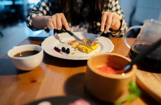 istock eating homemade breakfast:rice omelet and fried salmon 1144717959