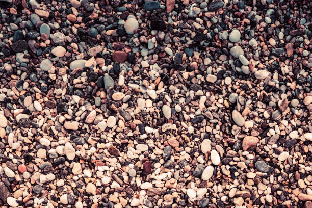 istock Sea pebble texture. Marine mineral beauty harmony. Beach stones surface. 1144720235