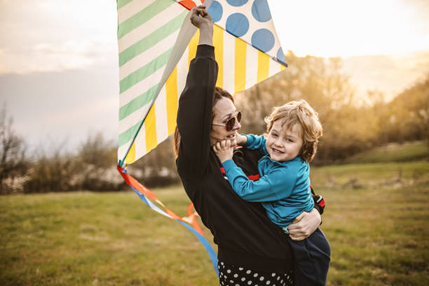 istock Mother and son playing in nature 1144721296