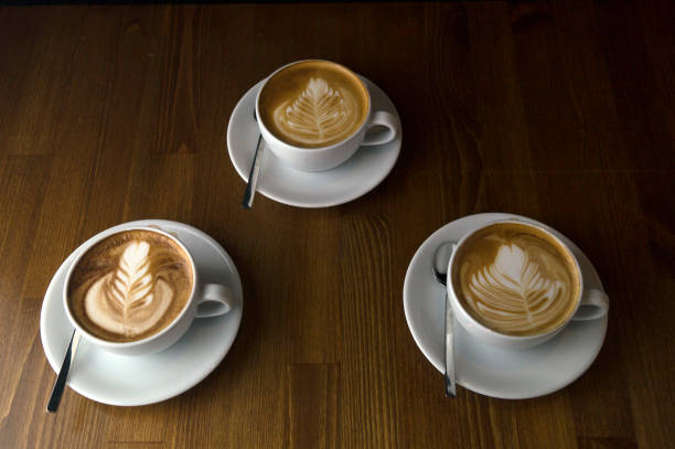 istock three cups ready to be served coffee with milk 1144721325