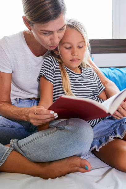 istock Reading mother and daughter 1144723119