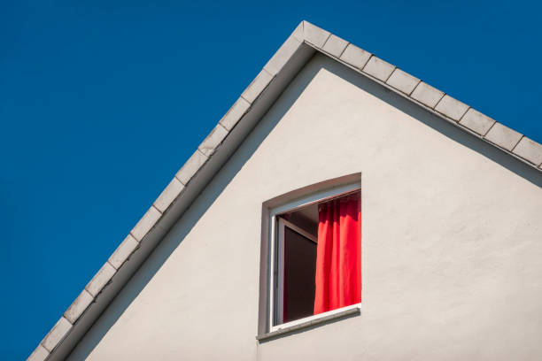 Red curtain in the open window