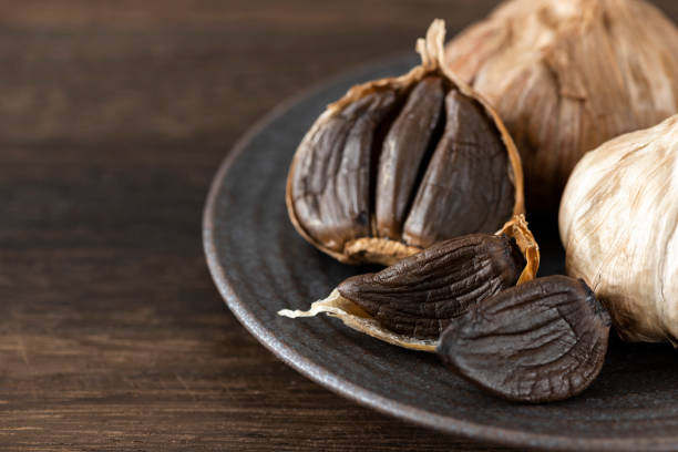 istock Black garlic, garlic fermented healthy food 1144725501