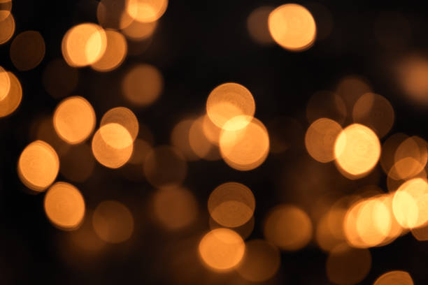 istock Christmas lights abstract with shiny yellow bokeh effect 1144726766
