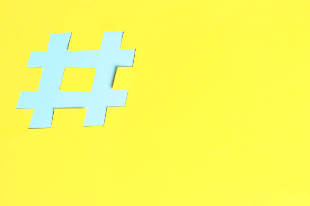 istock Hashtag sign isolated on background, close-up, copy space 1144728307
