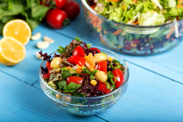 istock Fresh mixed vegetables salad in a bowl 1144730625