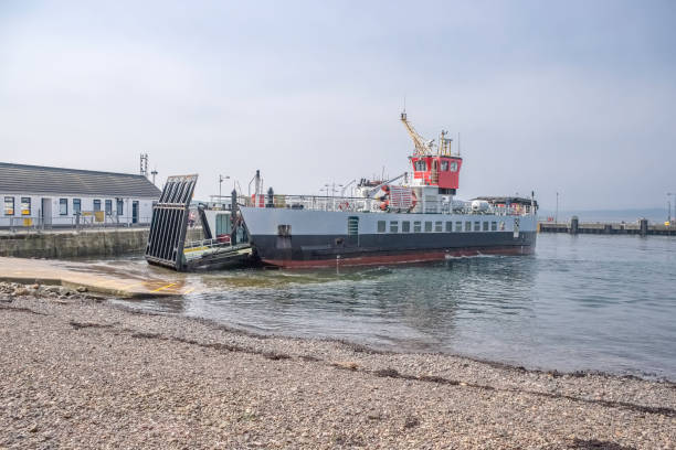 istock Largs and the Local Ferry Approaching largs Pier on the Easter Weekend 1144730933