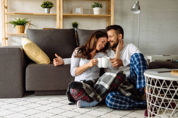 istock Loving couple relaxing at home 1144731245