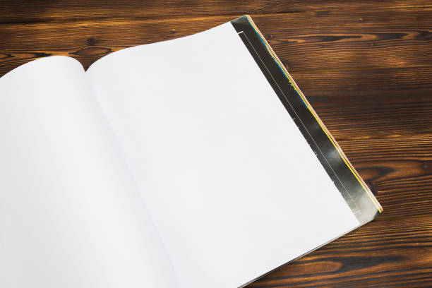 istock Mock-up magazine or catalog on wooden table.- Image 1144731966