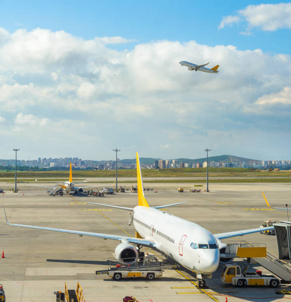 istock Planes, buses at airport runway 1144737556